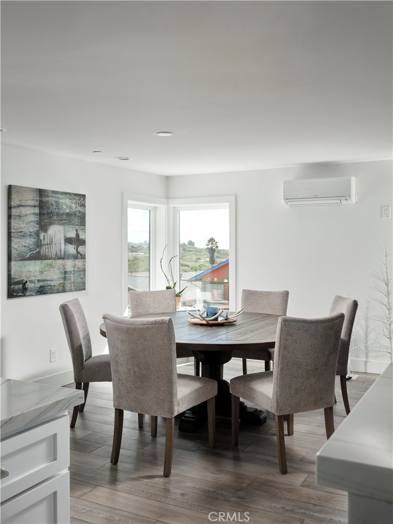311 Juanita Avenue Oceano, CA 93445 - Photo 8 of 27 a view of a dining room with furniture window and wooden floor