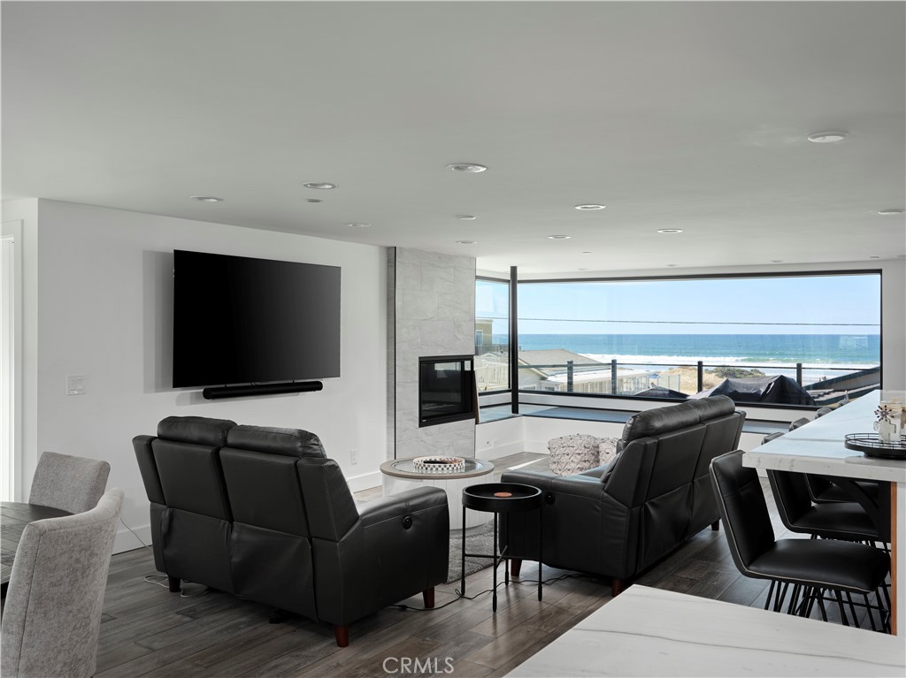 311 Juanita Avenue Oceano, CA 93445 - Photo 9 of 27 a living room with furniture and a flat screen tv