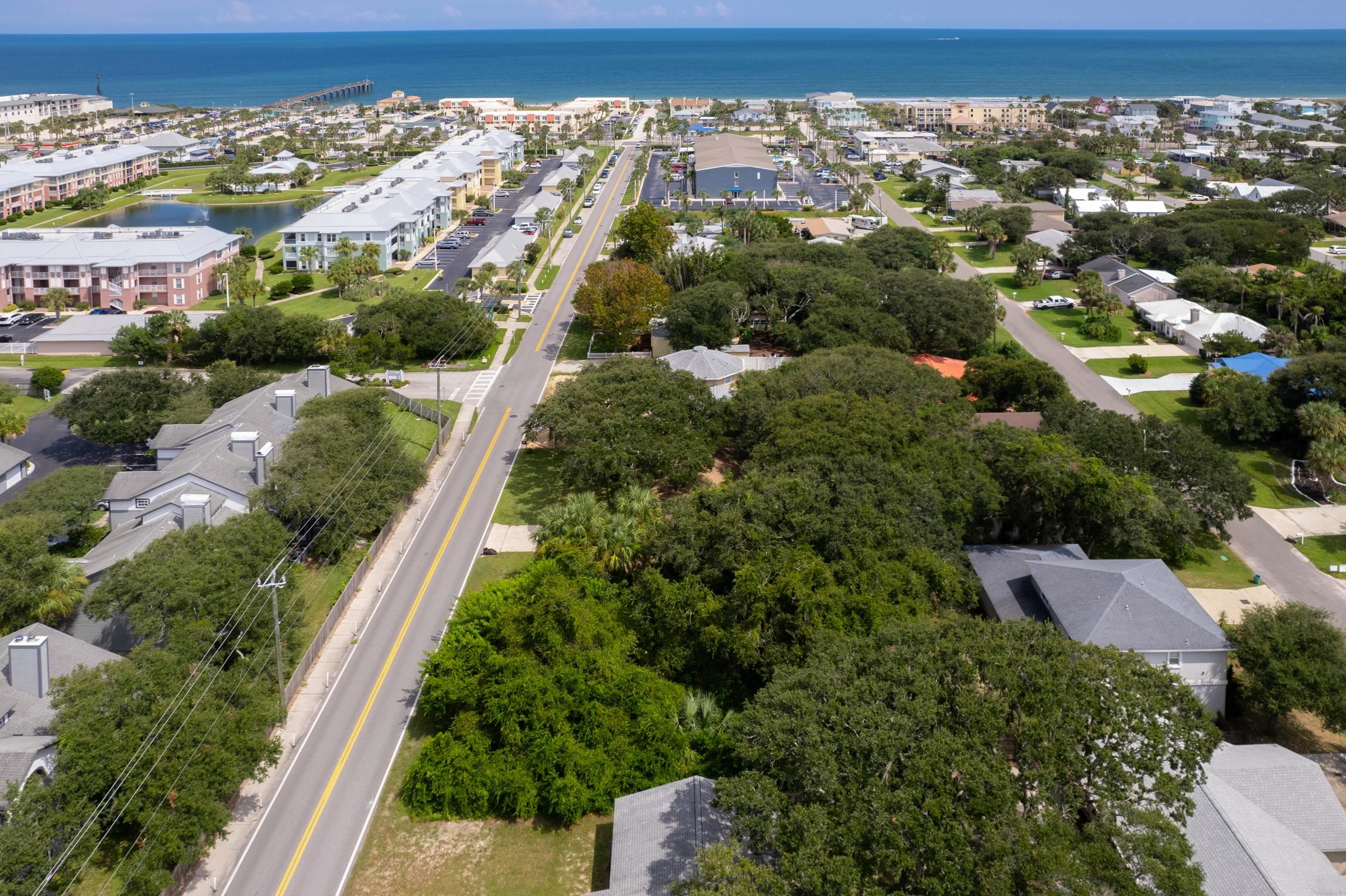 129 16th Street St. Augustine, FL 32080 - Photo 5 of 13 an aerial view of residential houses with outdoor space and trees
