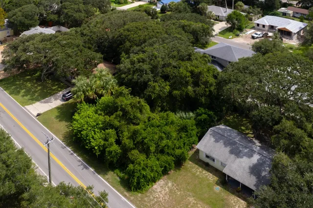 an aerial view of residential house with outdoor space