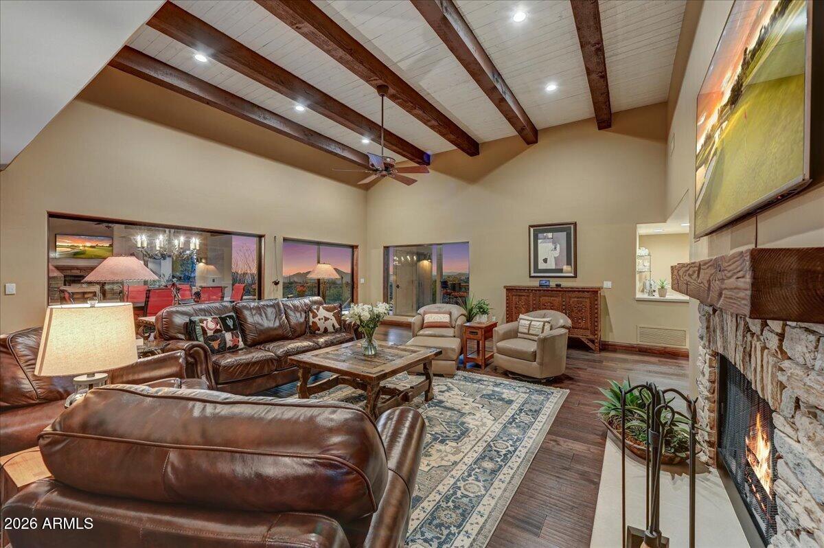 8343 East Spanish Boot Road Carefree, AZ 85377 - Photo 12 of 71 a living room with furniture and a flat screen tv