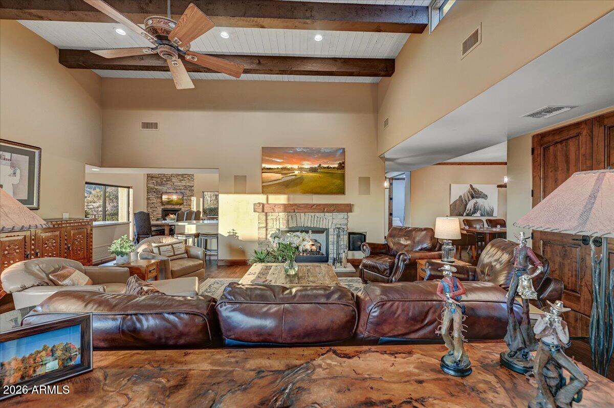 8343 East Spanish Boot Road Carefree, AZ 85377 - Photo 13 of 71 a living room with lots of furniture and a large window