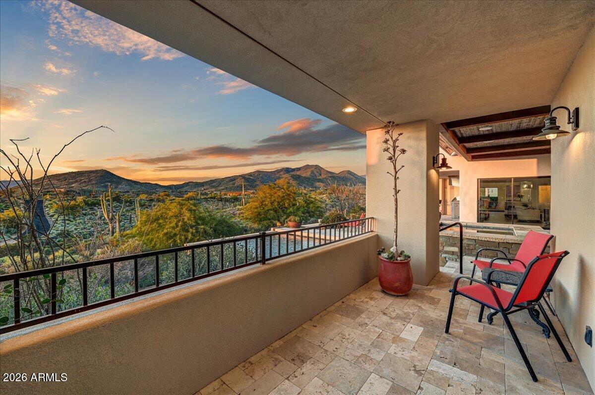 8343 East Spanish Boot Road Carefree, AZ 85377 - Photo 32 of 71 a view of a chairs and table in the balcony