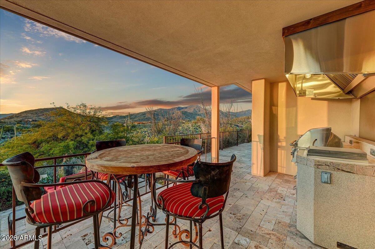 8343 East Spanish Boot Road Carefree, AZ 85377 - Photo 50 of 71 a view of a dining room with furniture window and outside view