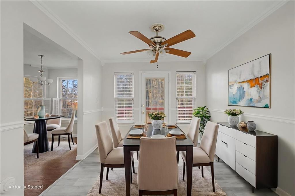 4244 Akins Ridge Lane Powder Springs, GA 30127 - Photo 13 of 37 a view of a dining room with furniture window and outside view