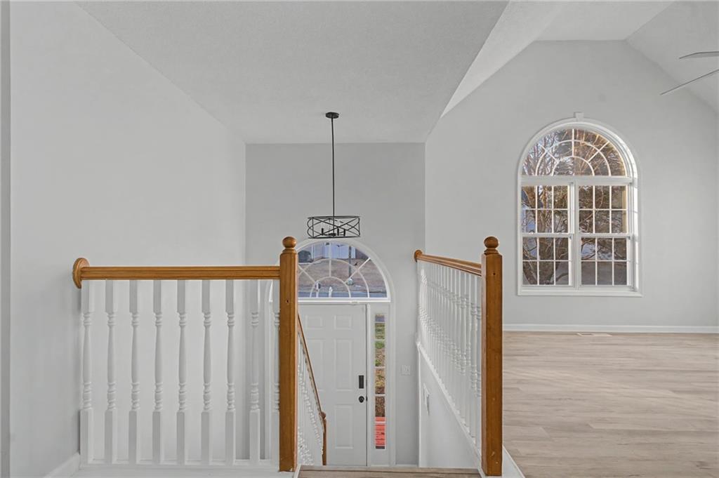 4244 Akins Ridge Lane Powder Springs, GA 30127 - Photo 3 of 37 a view of a hallway with windows