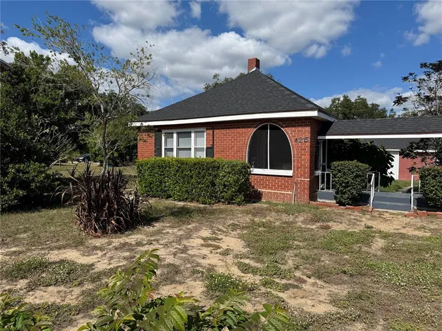 front view of house with a yard