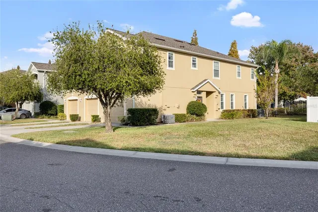 a view of a house with basketball court