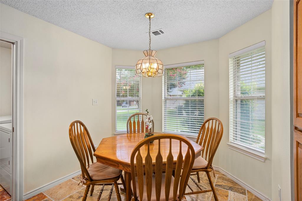 5522 Wedgefield Road Granbury, TX 76049 - Photo 11 of 22 a view of a dining room with furniture window and outside view