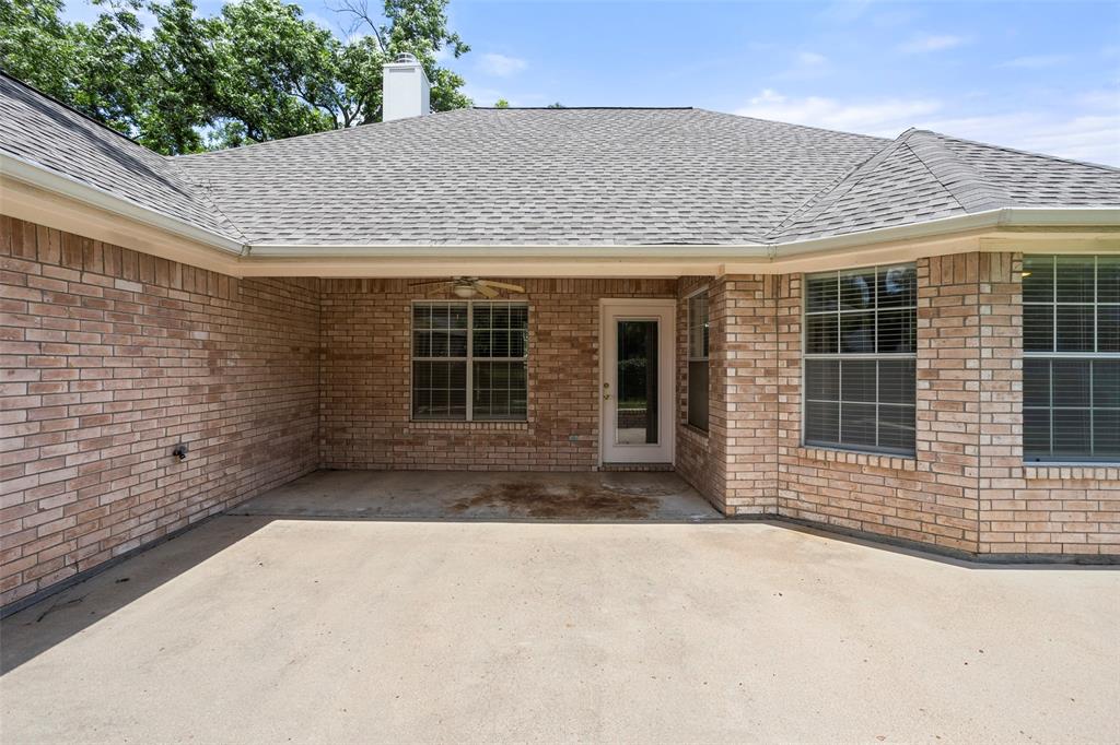 5522 Wedgefield Road Granbury, TX 76049 - Photo 21 of 22 a front view of a house