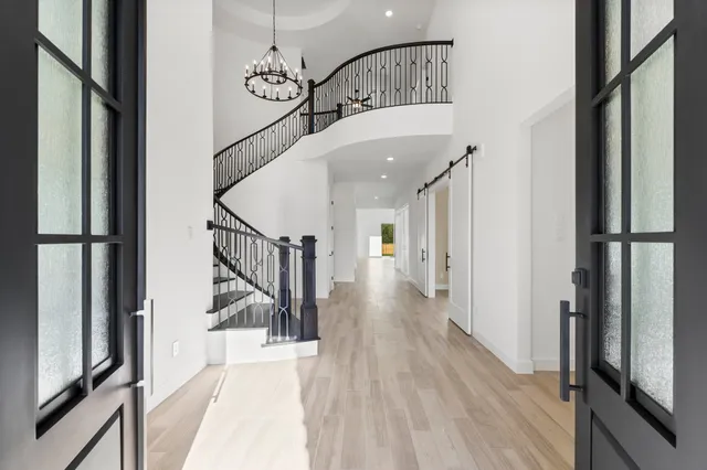 a view of entryway with wooden floor