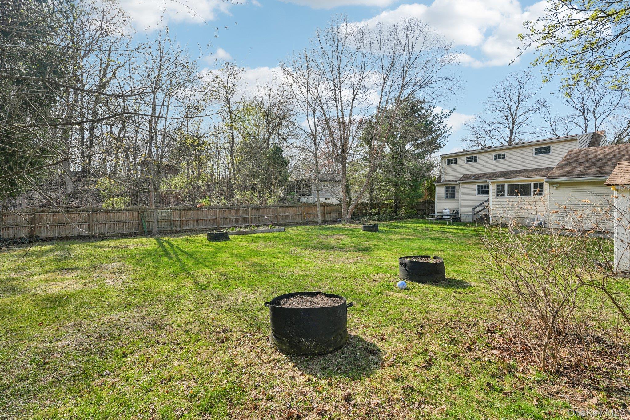 40 Widmer Road Wappingers Falls, NY 12590 - Photo 37 of 44 Fully fenced backyard with storage shed
