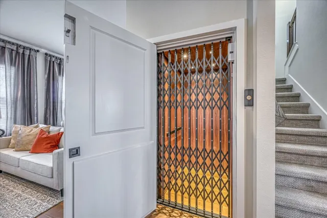 a bathroom with a granite countertop sink a large mirror and a shower