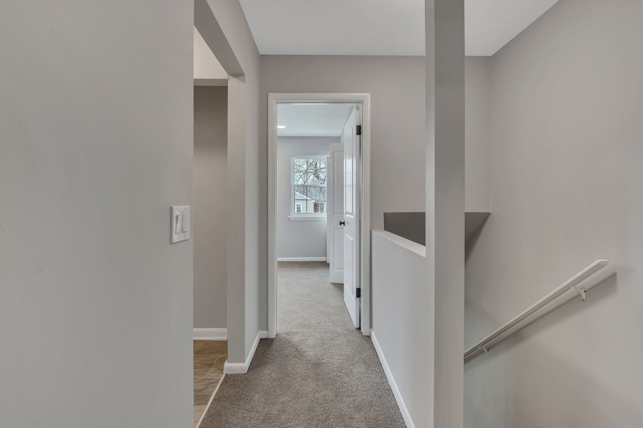 2004 Granville Road Franklin, TN 37064 - Photo 19 of 32 a view of a hallway with wooden floor