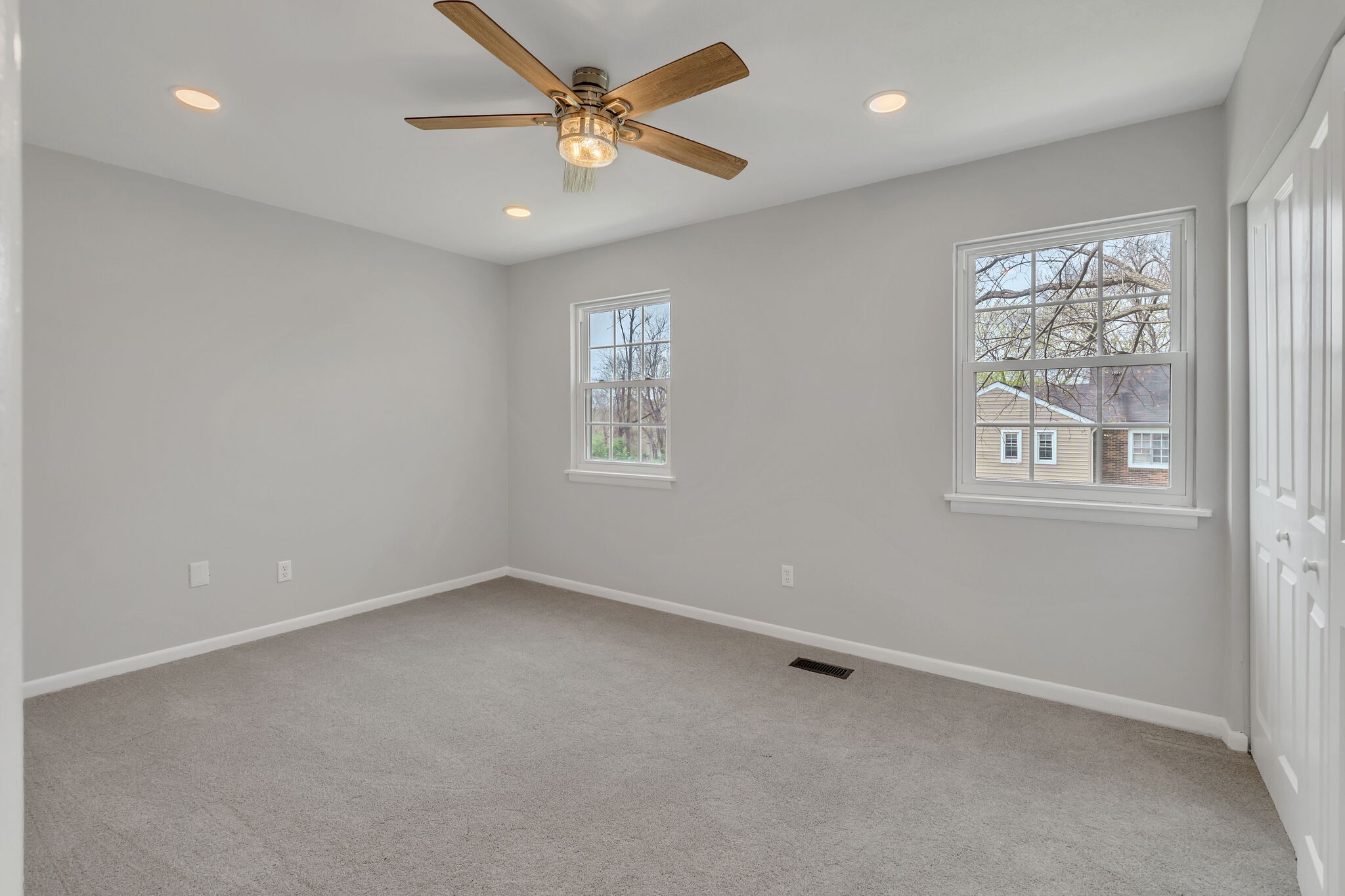 2004 Granville Road Franklin, TN 37064 - Photo 23 of 32 an empty room with windows and fan