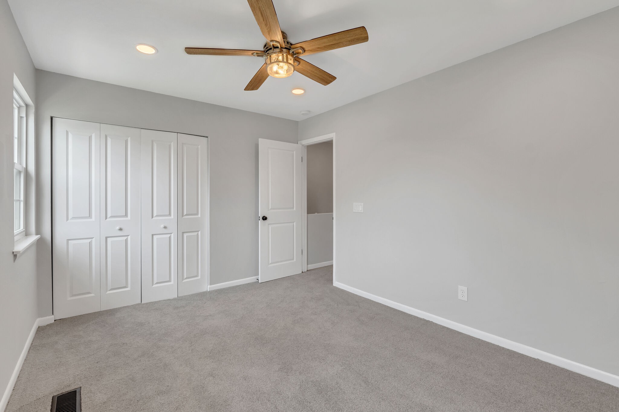 2004 Granville Road Franklin, TN 37064 - Photo 24 of 32 an empty room with a ceiling fan and a window