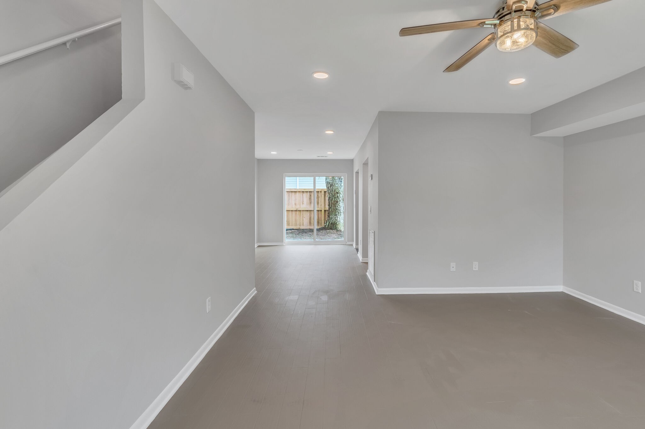 2004 Granville Road Franklin, TN 37064 - Photo 5 of 32 a view of a room with wooden floor and ceiling fan