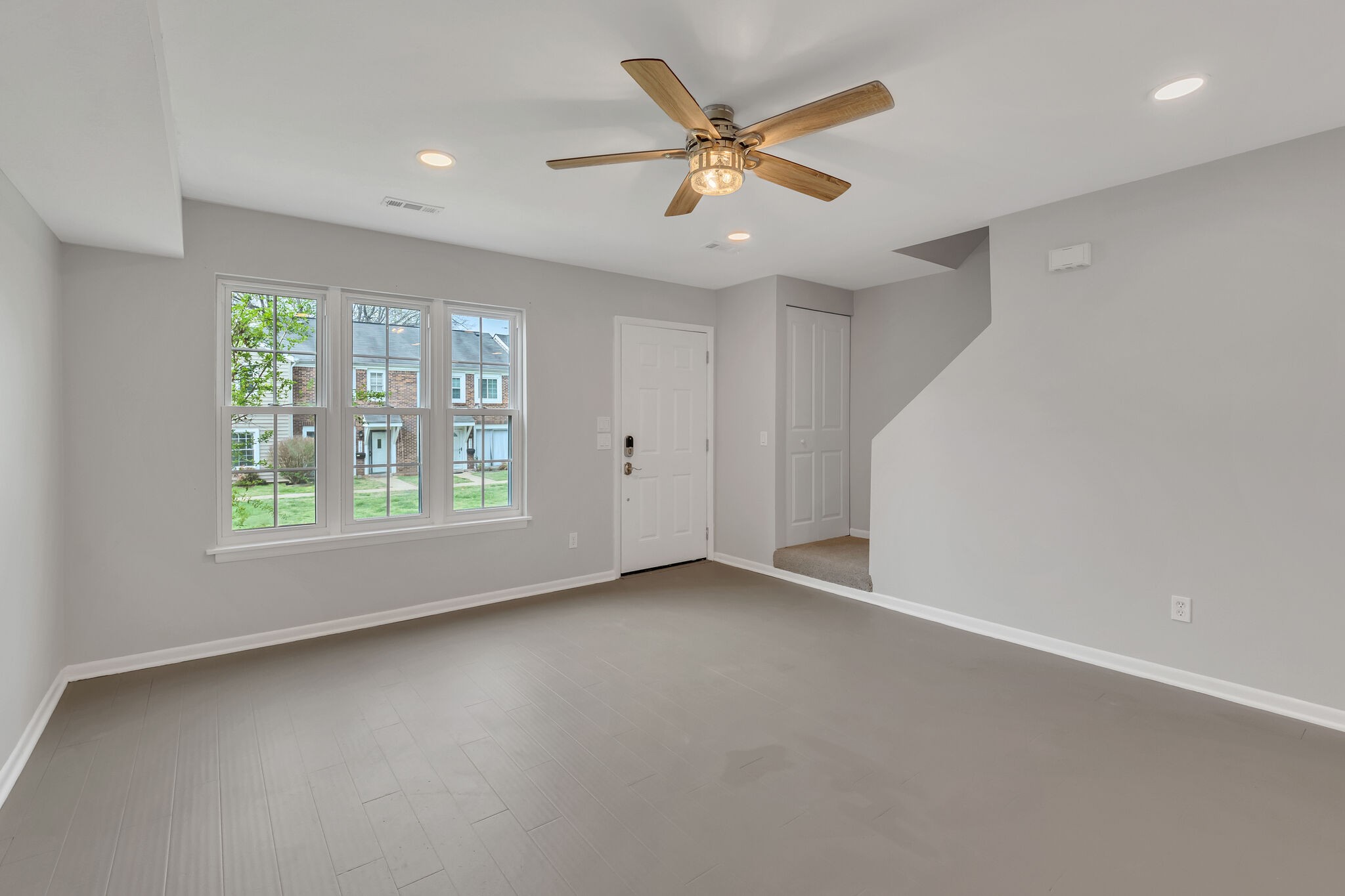 2004 Granville Road Franklin, TN 37064 - Photo 6 of 32 wooden floor in an empty room with a window