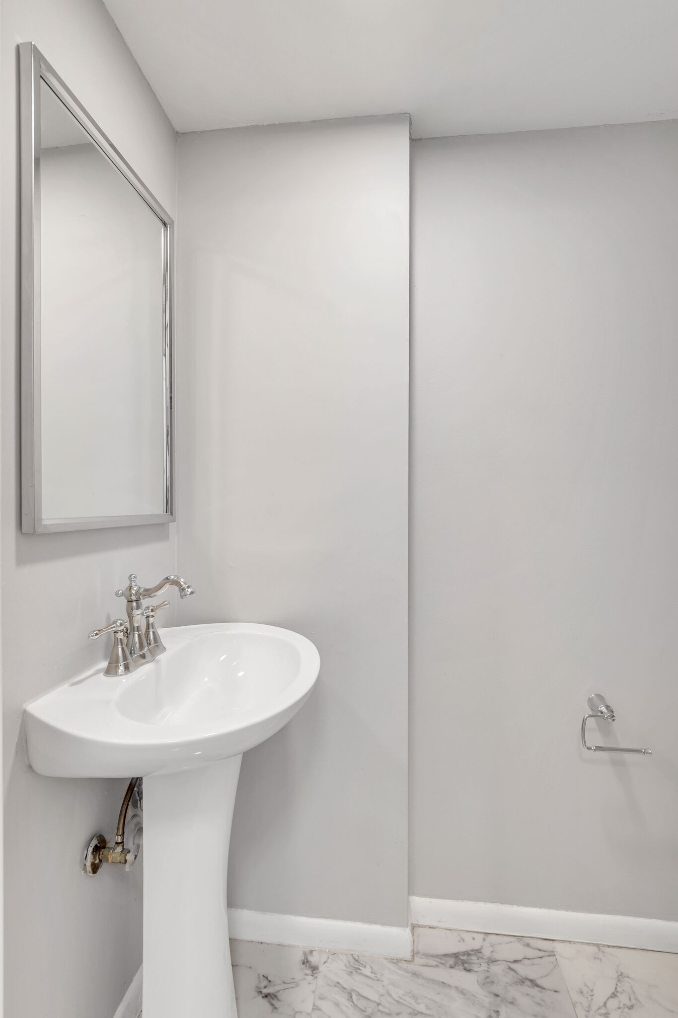 2004 Granville Road Franklin, TN 37064 - Photo 10 of 32 a bathroom with a sink and a mirror