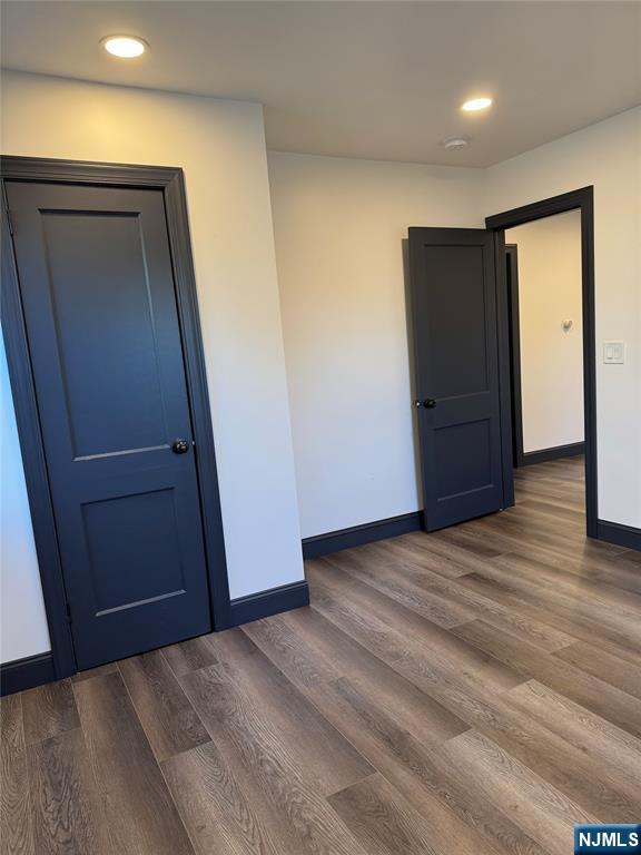 27 Emerald Street Hackensack, NJ 07601 - Photo 13 of 42 a view of hallway with wooden floor