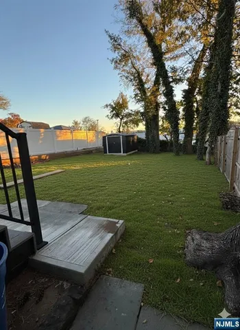 a view of a wooden deck with garden