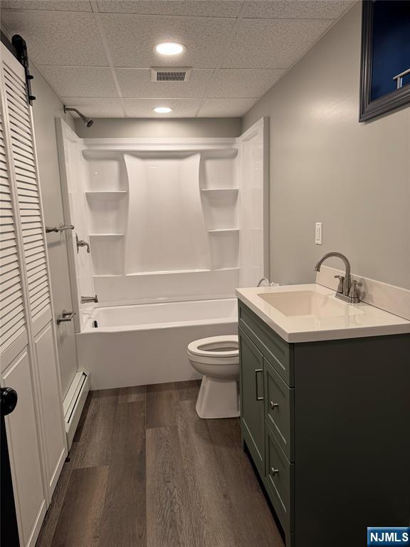 27 Emerald Street Hackensack, NJ 07601 - Photo 30 of 42 a bathroom with a sink a toilet and a bathtub