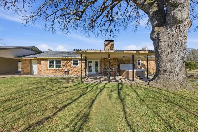 a view of a house with swimming pool