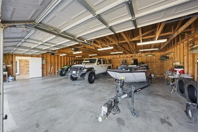 a view of house with outdoor space and swimming pool