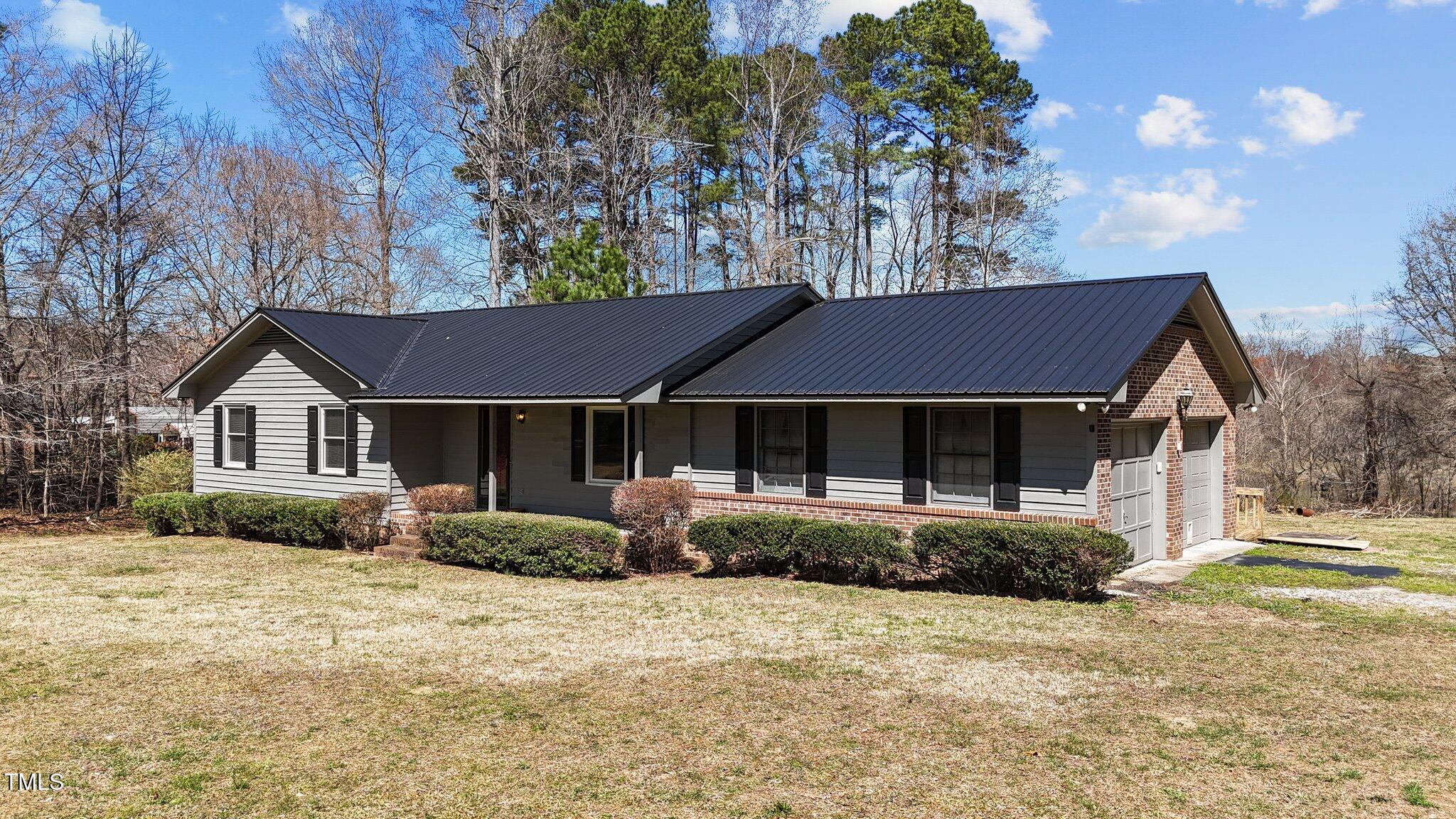 706 Dyking Road Louisburg, NC 27549 - Photo 2 of 17 2-web-or-mls-DJI_20250318122846_0861_D
