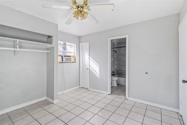 a view of an empty room and window
