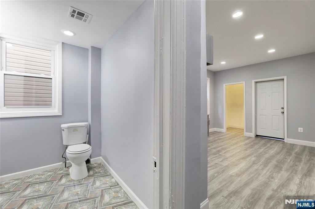 119 Ridgewood Avenue Newark, NJ 07108 - Photo 15 of 38 a bathroom with a toilet