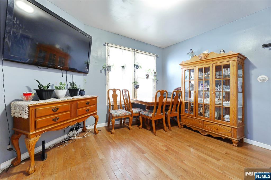 119 Ridgewood Avenue Newark, NJ 07108 - Photo 28 of 38 a room with furniture pool table flat screen tv and windows