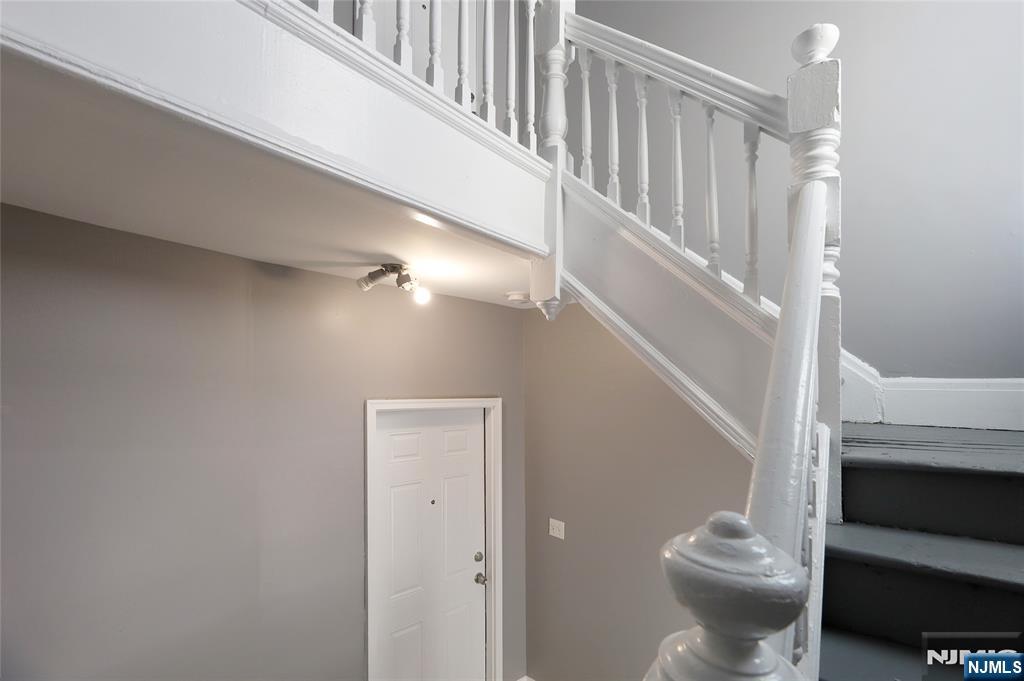 119 Ridgewood Avenue Newark, NJ 07108 - Photo 6 of 38 a bathroom with a toilet and a shower