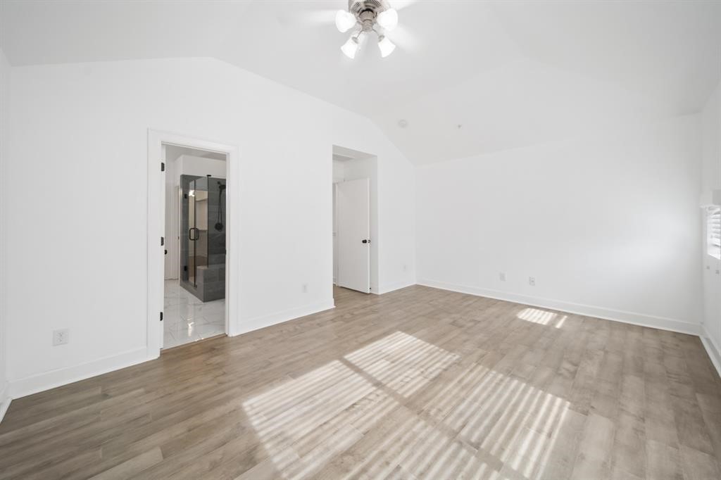 7650 Springhill Street, Unit 403 Houston, TX 77021 - Photo 15 of 30 an empty room with wooden floor and closet