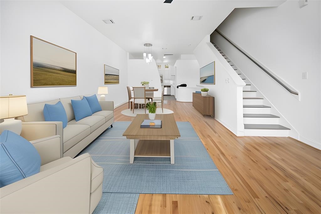7650 Springhill Street, Unit 403 Houston, TX 77021 - Photo 6 of 30 a living room with furniture and wooden floor