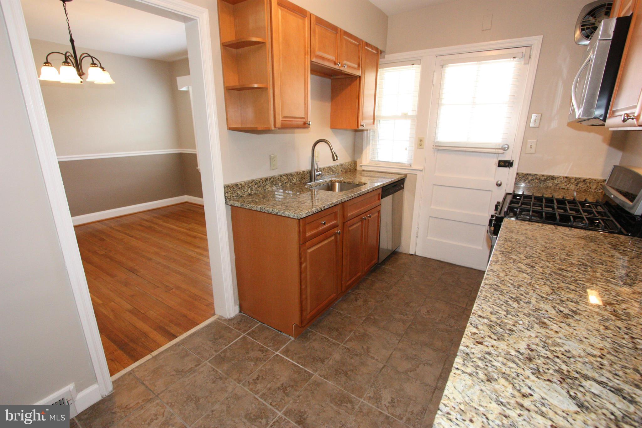 1842 Glen Ridge Road Baltimore, MD 21286 - Photo 7 of 30 CERAMIC FLOOR COMPLEMENTS THE CABINETRY