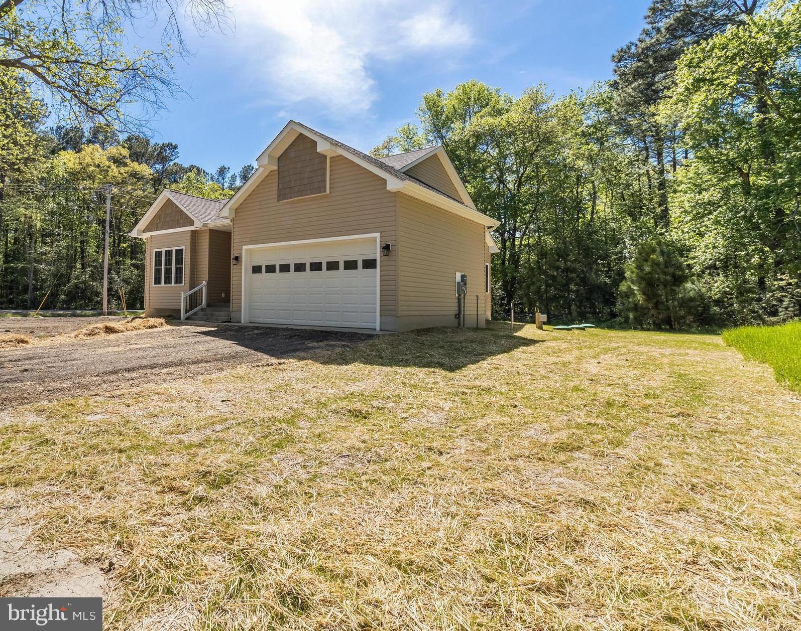 21183 Abell Road Avenue, MD 20609 - Photo 36 of 36 a view of a house with a yard