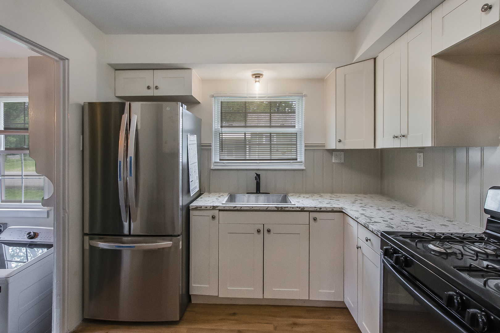 130 South Park Road Joliet, IL 60433 - Photo 12 of 22 a kitchen with a refrigerator sink and cabinets