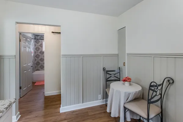 a room with furniture and wooden floor