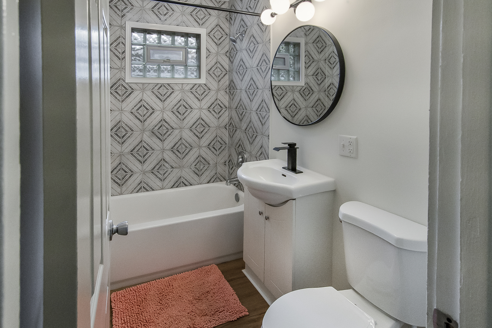 130 South Park Road Joliet, IL 60433 - Photo 18 of 22 a bathroom with a toilet and a sink