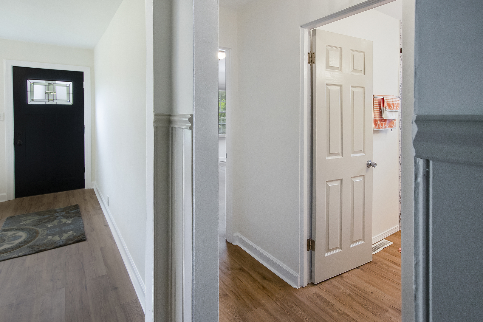 130 South Park Road Joliet, IL 60433 - Photo 9 of 22 a view of a hallway with wooden floor and entryway