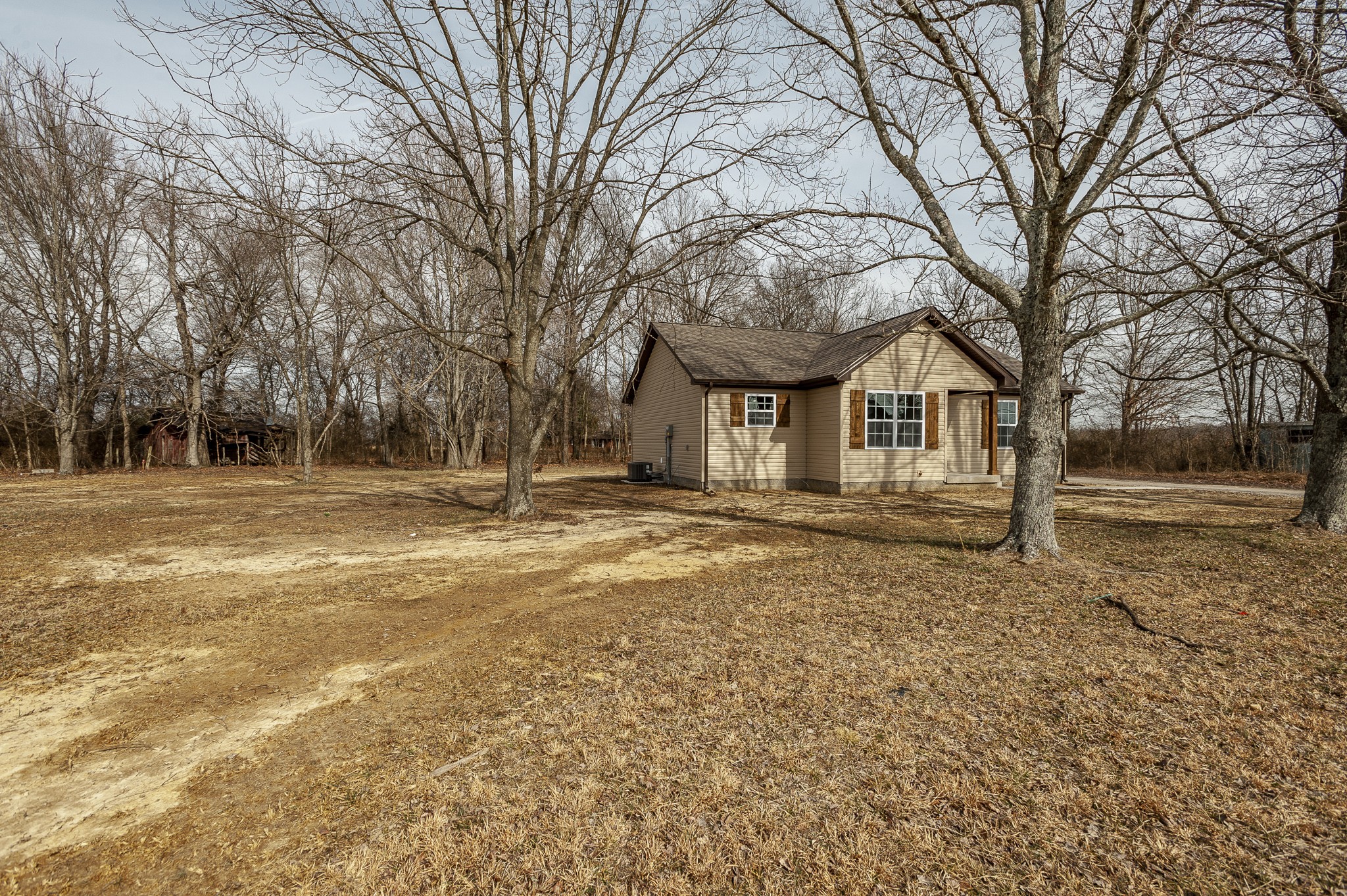 4641 Highway 161 Springfield, TN 37172 - Photo 4 of 25 a house with trees in front of it
