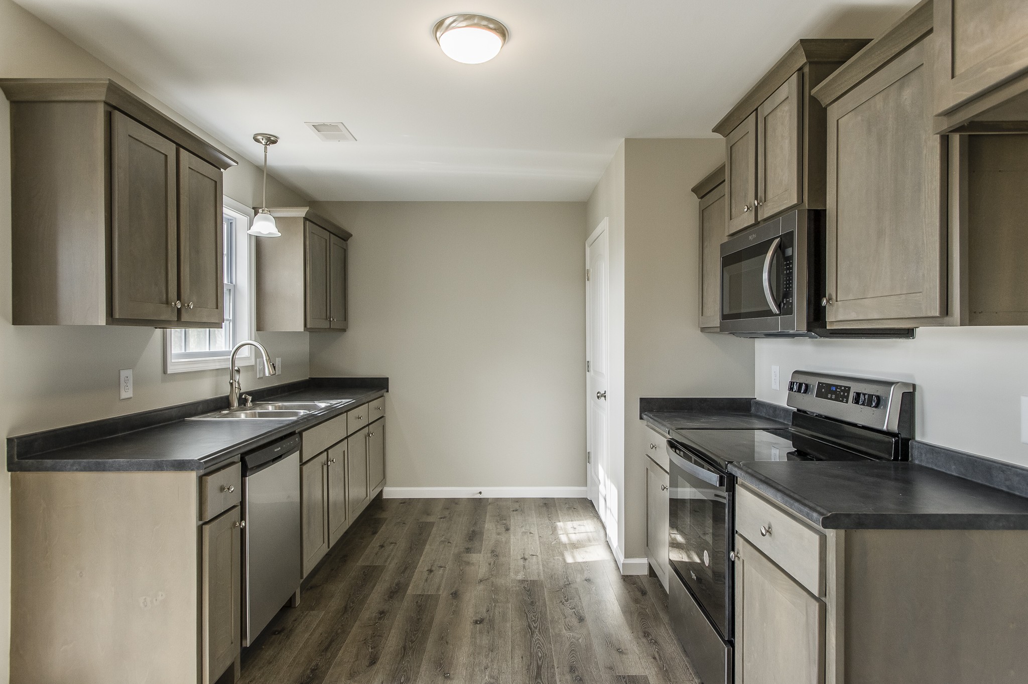 4641 Highway 161 Springfield, TN 37172 - Photo 8 of 25 a kitchen with stainless steel appliances granite countertop a stove and a sink