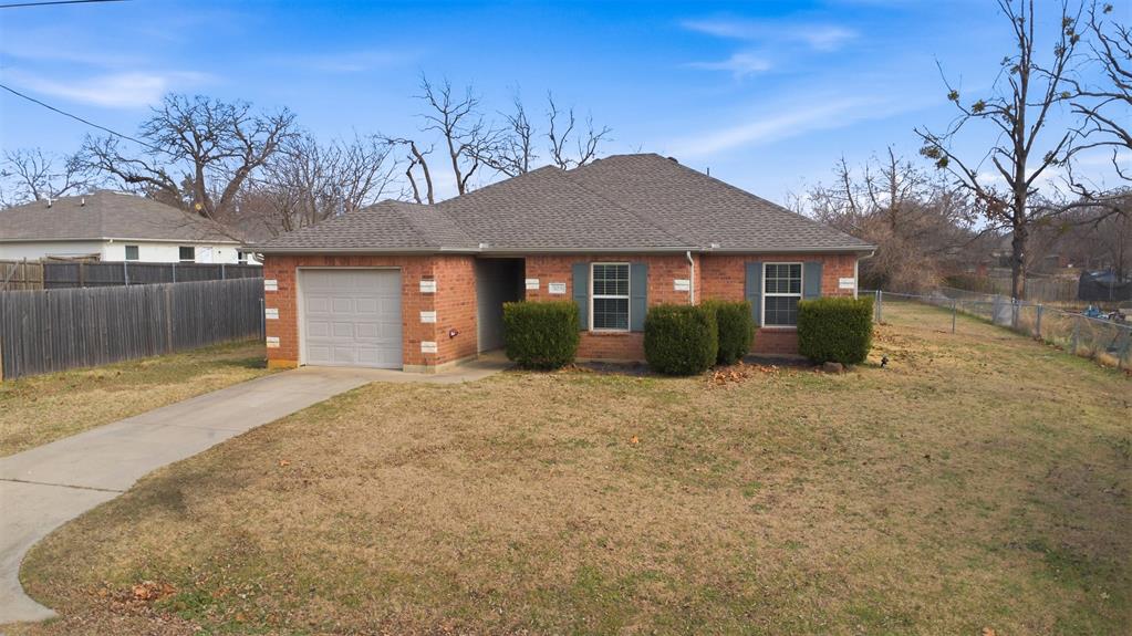 503 Caddell Street Aubrey, TX 76227 - Photo 3 of 39 front view of a house with a yard