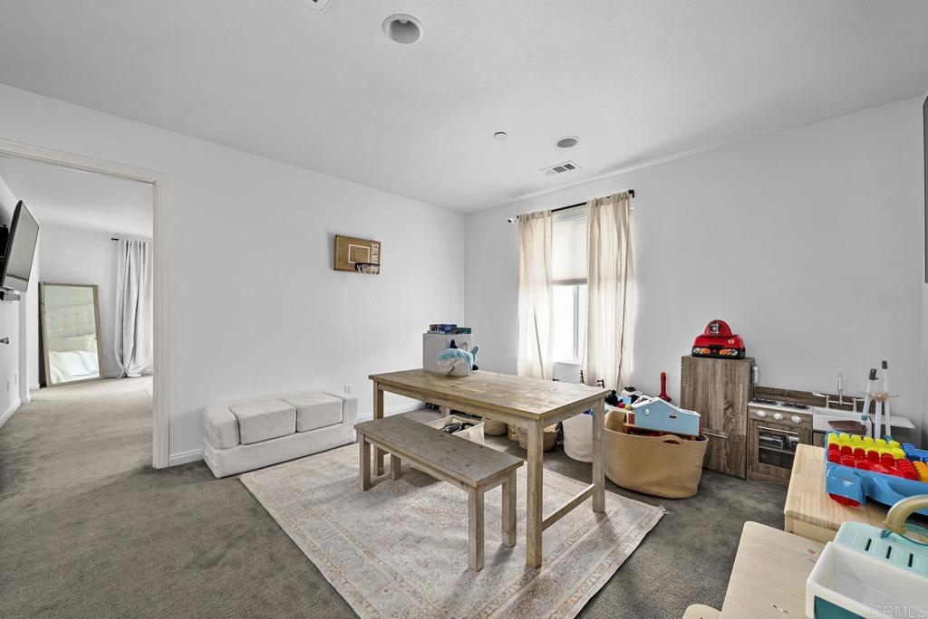 8614 Skylight Way El Cajon, CA 92021 - Photo 30 of 65 a dining room with furniture and window
