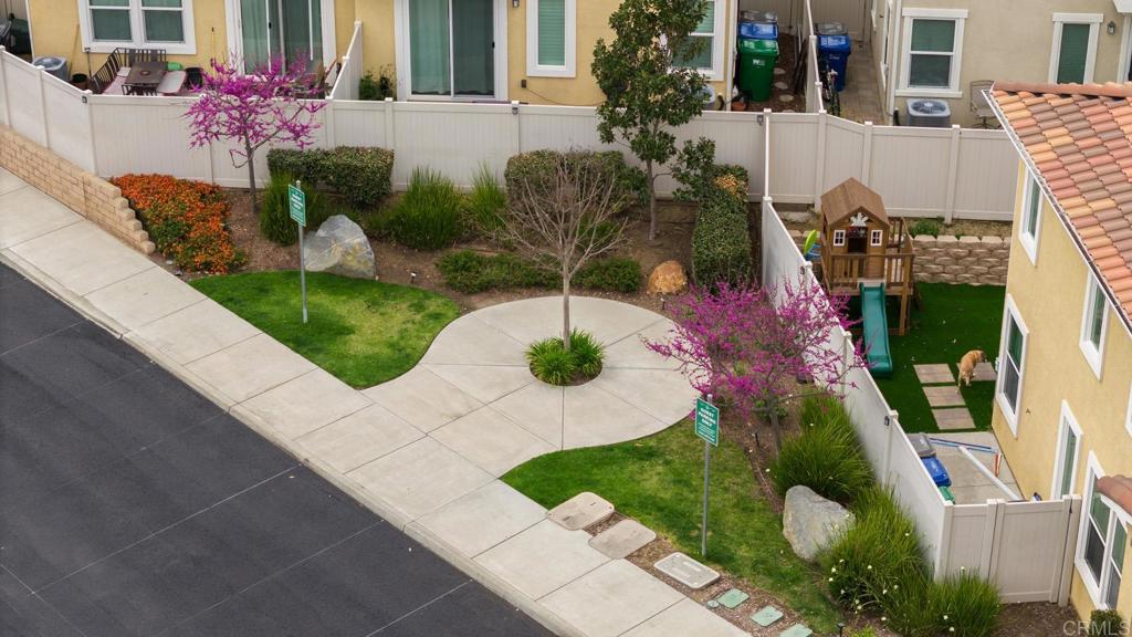 8614 Skylight Way El Cajon, CA 92021 - Photo 55 of 65 a view of a fountain in front of a house