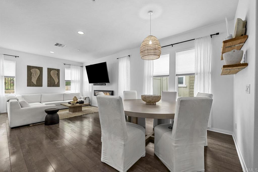 8614 Skylight Way El Cajon, CA 92021 - Photo 10 of 65 a view of a livingroom with furniture and a flat screen tv