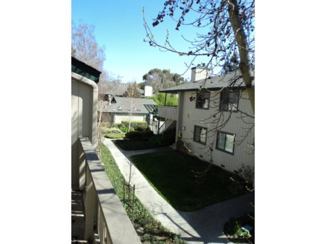 1440 Alma Loop San Jose, CA 95125 - Photo 8 of 9 a living room with furniture and a fireplace