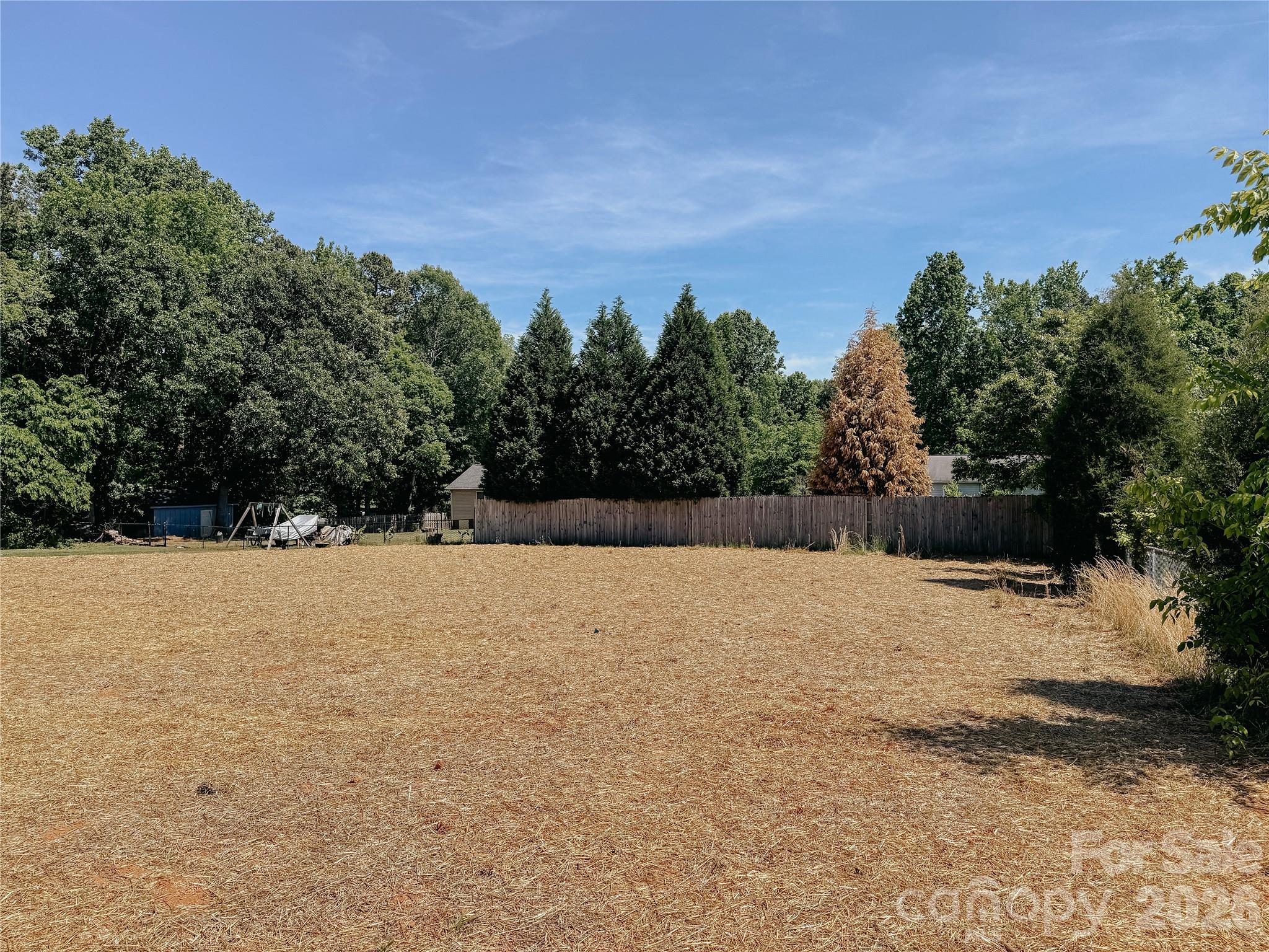1455 West Ridge Road Salisbury, NC 28147 - Photo 25 of 26 a backyard of a house with lots of green space