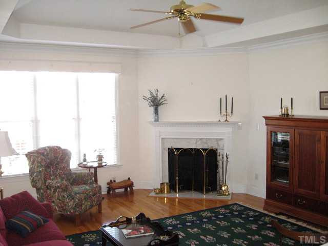 3426 Barron Berkeley Way Raleigh, NC 27612 - Photo 2 of 14 Great family room with gas log fireplace & high tray ceiling Den/Family/Great Room